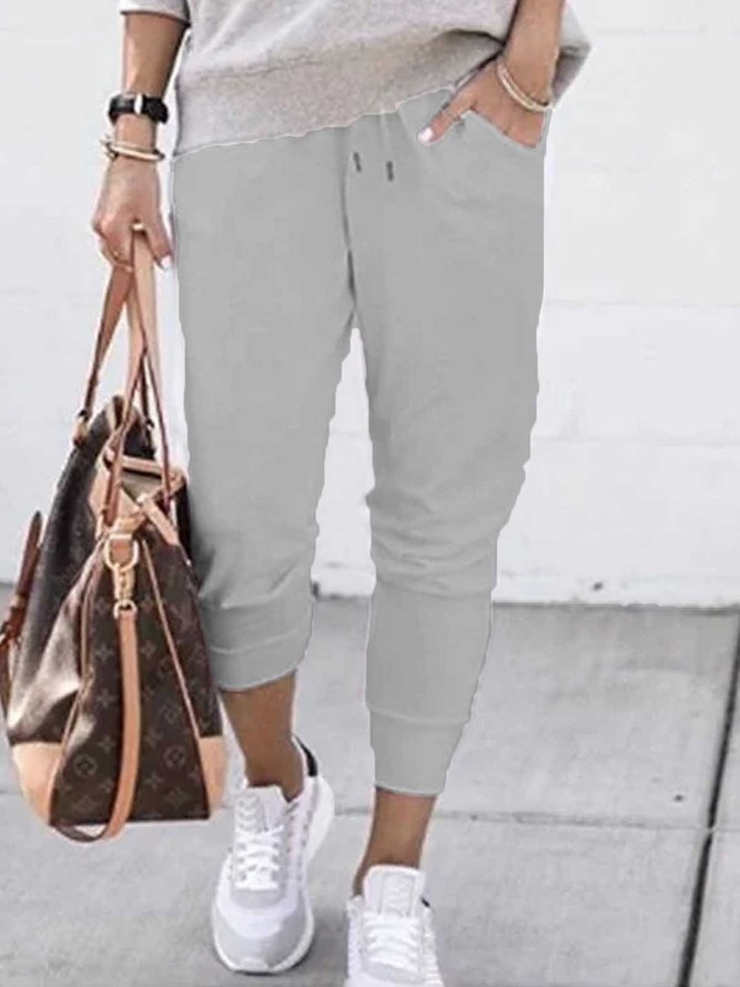 White Pockets Solid Cotton Casual Pants